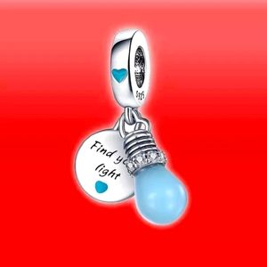 Glow in the dark light bulb Sterling Silver charm